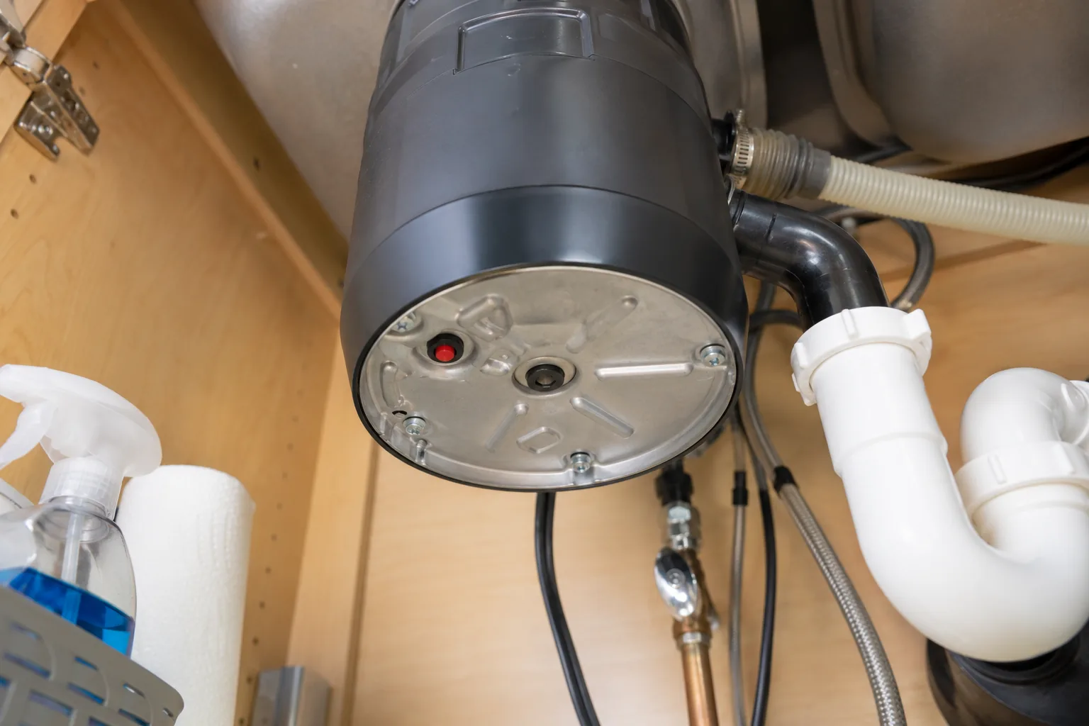 Garbage disposal reset button checked during garbage disposal repair by Barnard Appliance Repair in Bucks County, PA